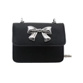 Chic black mini crossbody bag with a large silver bow detail and metal chain strap - Black