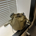 Army green nylon drawstring bucket bag with side mesh pocket and adjustable shoulder strap - Green
