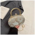 Detail of peony embroidery on light green satin bag with gold metal braided handle - Green