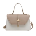 Chic two-tone crossbody bag with top handle and gold round buckle detail on white background - Khaki and White