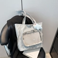 Silver metallic pleated tote bag with mesh pocket and star charm on leather chair - No Pendant / Silver