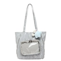 Silver tote bag with crinkled metallic texture and blue star charm on white background - Bag / Silver