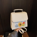 Beige college style backpack with floral window display and top handle for women - White