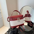 Retro canvas and red leather patchwork crossbody box bag shown in a mirrored reflection - Red