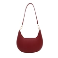 Deep red crescent moon shoulder bag with lychee texture leather and gold metal hardware - Red