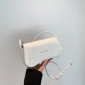 White mini handbag with crocodile pattern finish and Miss mini gold lettering logo - White