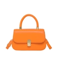 Vibrant orange saddle handbag with golden metal clasp and premium leather finish - Orange