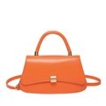 Vibrant orange faux leather handbag with curved base and gold metallic clasp - Orange