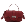 Classic red PU leather handbag with silver metal buckle and adjustable shoulder strap - Red