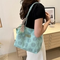 Mint green embossed floral tote bag with woven handles and decorative scarf accessory - Green