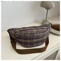Detail of vintage plaid corduroy waist bag with dual zippers and adjustable brown strap - Brown