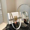 Chic white leather shoulder bag with gold chain strap and rectangular metal lock - White