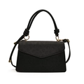 Elegant black embossed clover patterned crossbody bag with golden hardware and top handle - Black