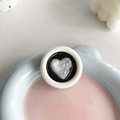 Detail of Korean-style retro round phone grip with a silver textured heart center - Round Drip Glue Silver Wrinkled Heart