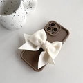 Detail of coffee-colored iPhone case with large cream fabric bow decoration - Cream Coffee - Large Space Cotton Bow / iPhone 7/8/SE 2020