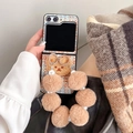 Detail of tweed foldable case featuring plush bear embroidery and pearl lanyard strap - Samsung Z Flip 3 / Multi-color Brown Tweed (With Plush Ball Pearl Chain)