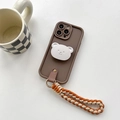 Dettaglio custodia iPhone con supporto orso 3D e cinturino da polso intrecciato arancione - Supporto Orsetto Argento + Corda Corta Intrecciata / iPhone 7/8/SE 2020