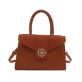 Brown leather crossbody bag for women featuring a vintage gold hollow clasp design - Brown