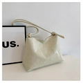 Dettaglio della borsa tote minimalista in pelle crema con cuciture e tracolla con nodo - Bianco Sporco