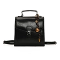 Retro black leather backpack handbag with silver buckle and woven bell charm accent - With Pendant / Black