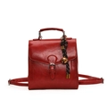 Retro bright red faux leather backpack with top handle and decorative bell pendant charm - With Pendant / Red