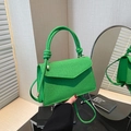 Grass green woven textured crossbody bag with thick knotted handle and shoulder strap - Green
