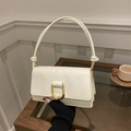 Chic cream white baguette bag with golden U-shaped buckle and knotted leather handle - White