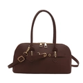 Dark coffee brown shell-shaped crossbody bag with gold hardware and PU leather finish - Brown