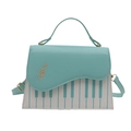 Mint green and white contrast handbag with piano keys and embroidered treble clef - Blue
