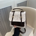 Zaino vintage da donna con pois colorati, dettagli in pelle marrone e logo Aimity 1986 - Bianco Sporco
