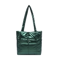 Deep green quilted puffer tote bag with metallic finish and silver button detail - Green