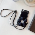 Close-up of black leather phone case with large 3D flower and adjustable crossbody strap - Cross-Pattern Rhinestone Flower Card Holder Crossbody Style / Samsung ZFlip3
