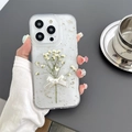 Detail of transparent iPhone case with gold foil, floral motifs and white 3D bow - iPhone 7/8/SE 2020