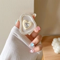 Dettaglio del supporto per telefono a forma di cuore con finitura crema e strass lucido - Base Irregolare Cuore Con Strass Scintillanti Bianchi - Bianco