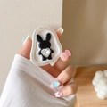Close-up of a sparkling rhinestone heart rabbit pop socket phone grip on a white base - Irregular Base White Sparkle Rhinestone Rabbit - Black