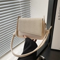 Quilted cream shoulder bag for women with woven texture and decorative rope knot strap - Off White