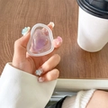 Detail of iridescent purple heart phone grip with star glitters and hand holder - Marble Rendered Purple