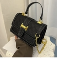 Black pebbled leather crossbody bag with white stitching and gold H-buckle detail - Black