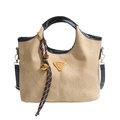 Bolso tipo cubo de lona bicolor con asas de cuero y detalle de borla en vista frontal - Sin colgante / Negro