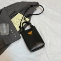 Minimalist black rectangular leather crossbody bag with iconic triangle logo and knot strap - Without Pendant / Black