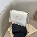 Minimalist white leather crossbody bag with gold chain strap and fashion lettering - White