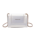 Elegant pearl white leather square mini bag with golden chain and lettering detail - White
