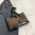 Chic houndstooth wool tote bag with red stripes and black leather handles on a suit - Coffee With Pendant