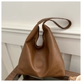 Detailed view of the soft vintage brown faux leather texture on the large tote shoulder bag - Brown