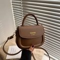 Chic dark brown matte leather saddle bag for women with gold logo and adjustable strap - Brown