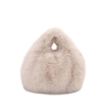 Plush faux fur handbag in beige featuring a soft furry texture and a round handle cutout - White