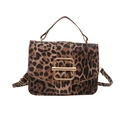 Winter leopard print crossbody bag with gold hardware and adjustable strap on white background - Brown