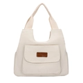 Bolso tote minimalista de lona beige con parche de cuero de moda en fondo blanco - Blanco