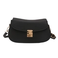 Classic black saddle bag for women with litchi texture and gold buckle on white background - Black