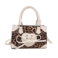 Brown leopard print small square bag with white heart detail and bow accent - White